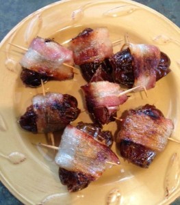 Bacon wrapped dates stuffed with pecans is a delicious snack!