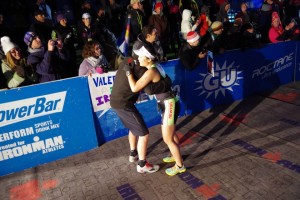 Team NEO athlete Khem giving Mike Reilly a hug at the finish line. Photo credit: Newton Running