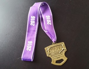 Finisher medal from the 2016 Super Half Marathon in Colorado Springs, February 7, 2016.