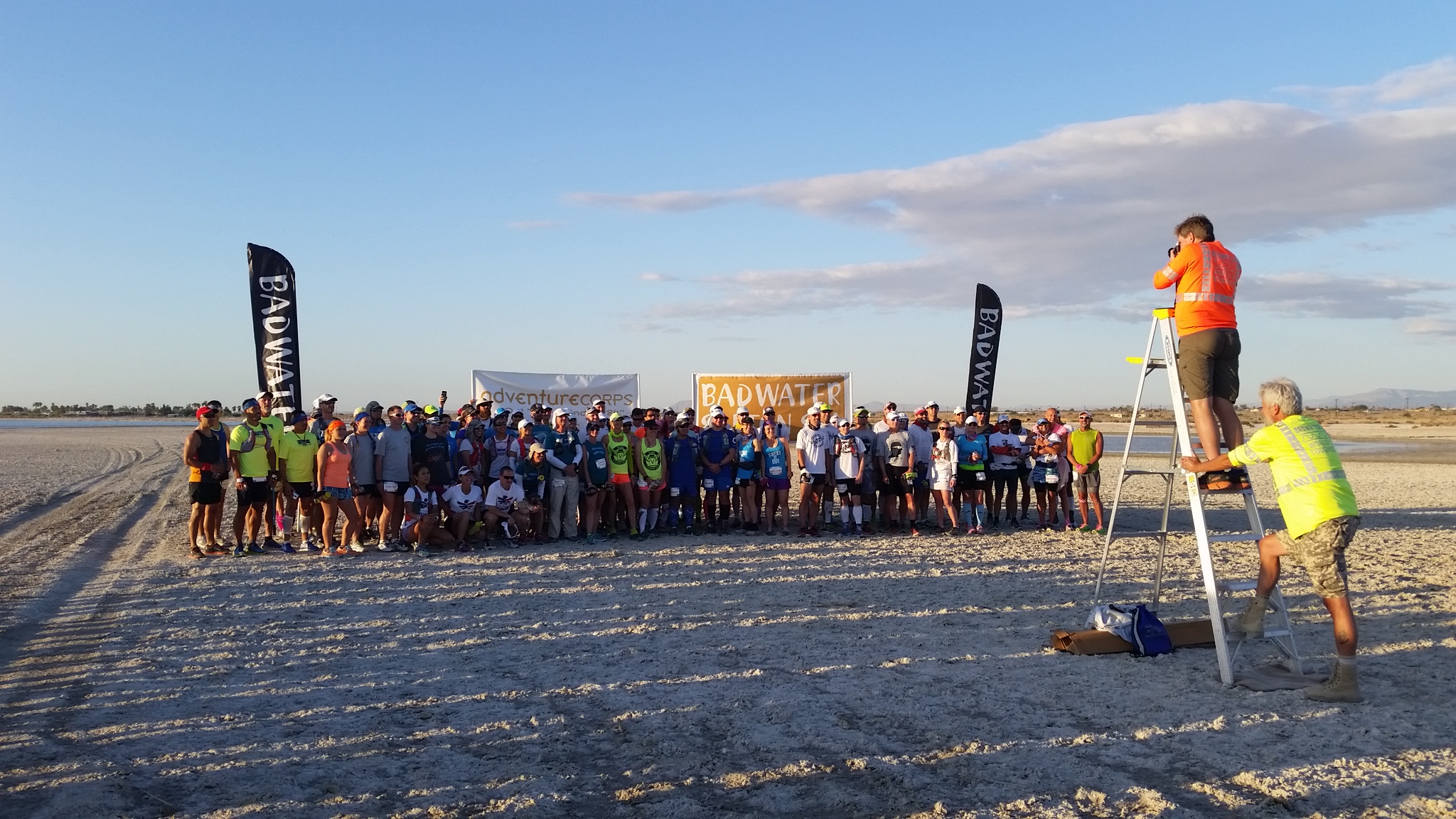 The teams are lined up and ready to go at the start of the 2016 Badwater Salton Sea ultra run while the race director, Chris, takes photos.