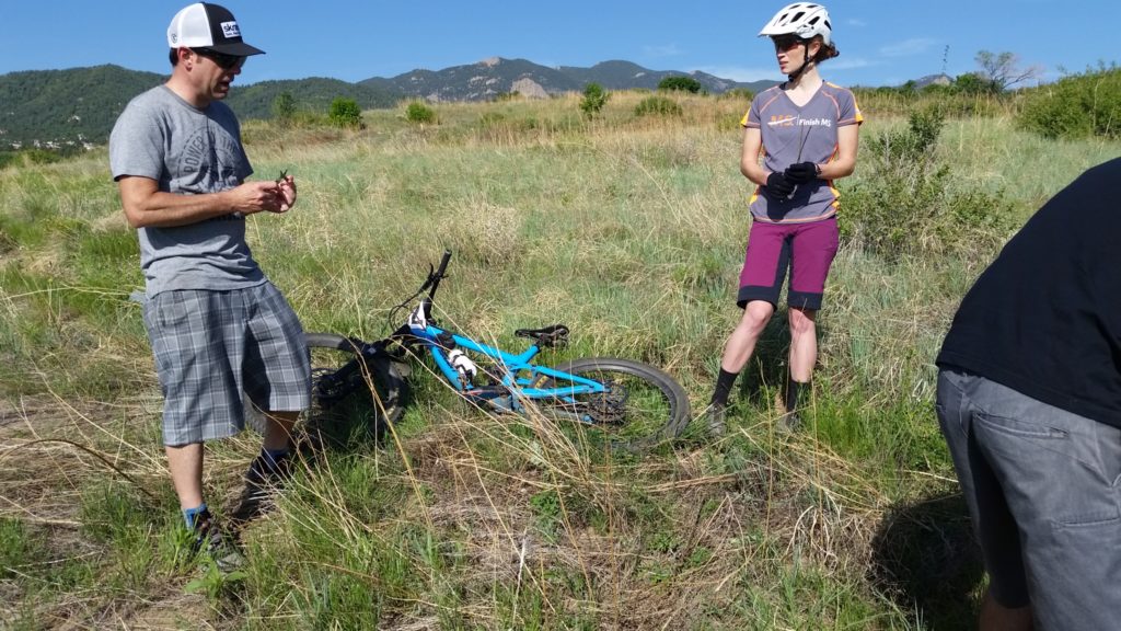 Arielle chatting with Mark as they prep for a mountain bike shot during the Finish MS photo shoot for the National MS Society in Colorado Springs, CO.