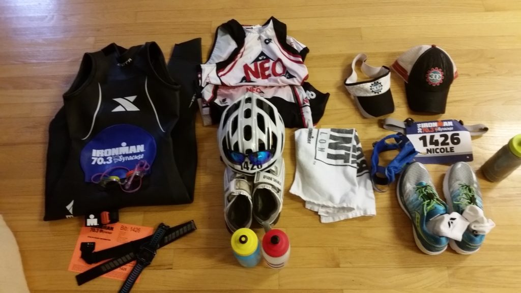 Coach Nicole’s 2016 IRONMAN Syracuse 70.3 race gear organized before packing it into her transition bag.