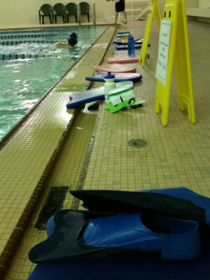Kick boards, fins, and paddles are useful tools when working on technique.