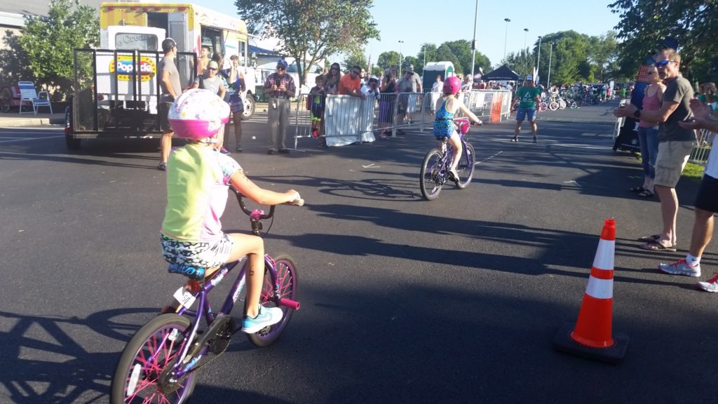 Kids heading to T2 at the end of their bike at the 2016 Trifest for MS in Bentonville, AR benefitting the Rampy MS Research Foundation.