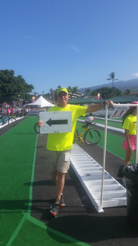 One of the many volunteers needed for the 2016 IRONMAN World Championships.