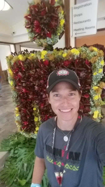 Coach Nicole and the IRONMAN logo in the lobby of the King Kamehameha hotel in Kona at the 2016 IRONMAN World Championship.